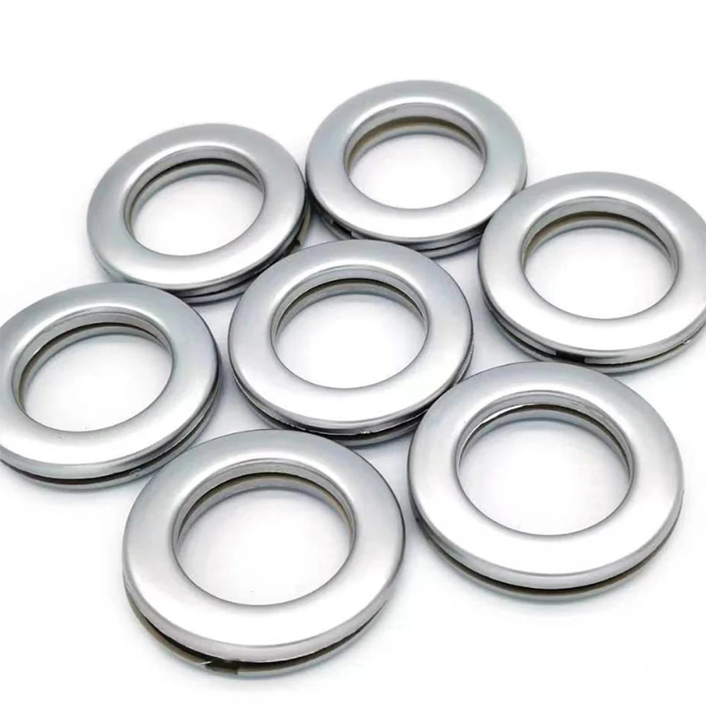 7 Œillets pour rideaux en plastique